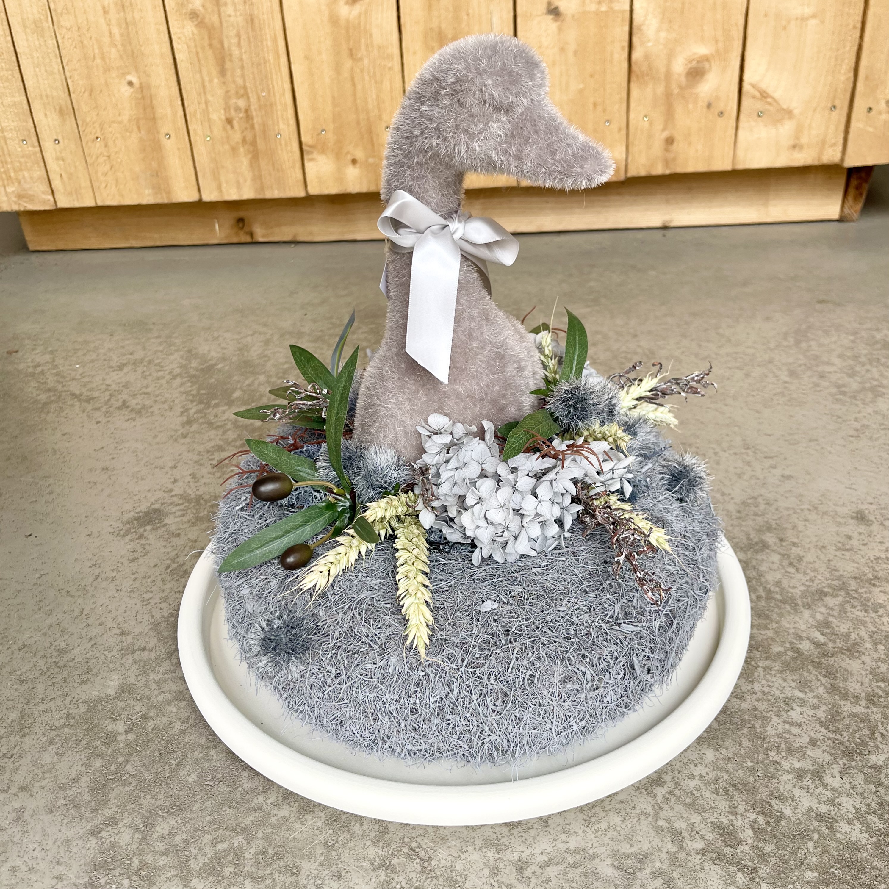 "Gans im Glück", grau