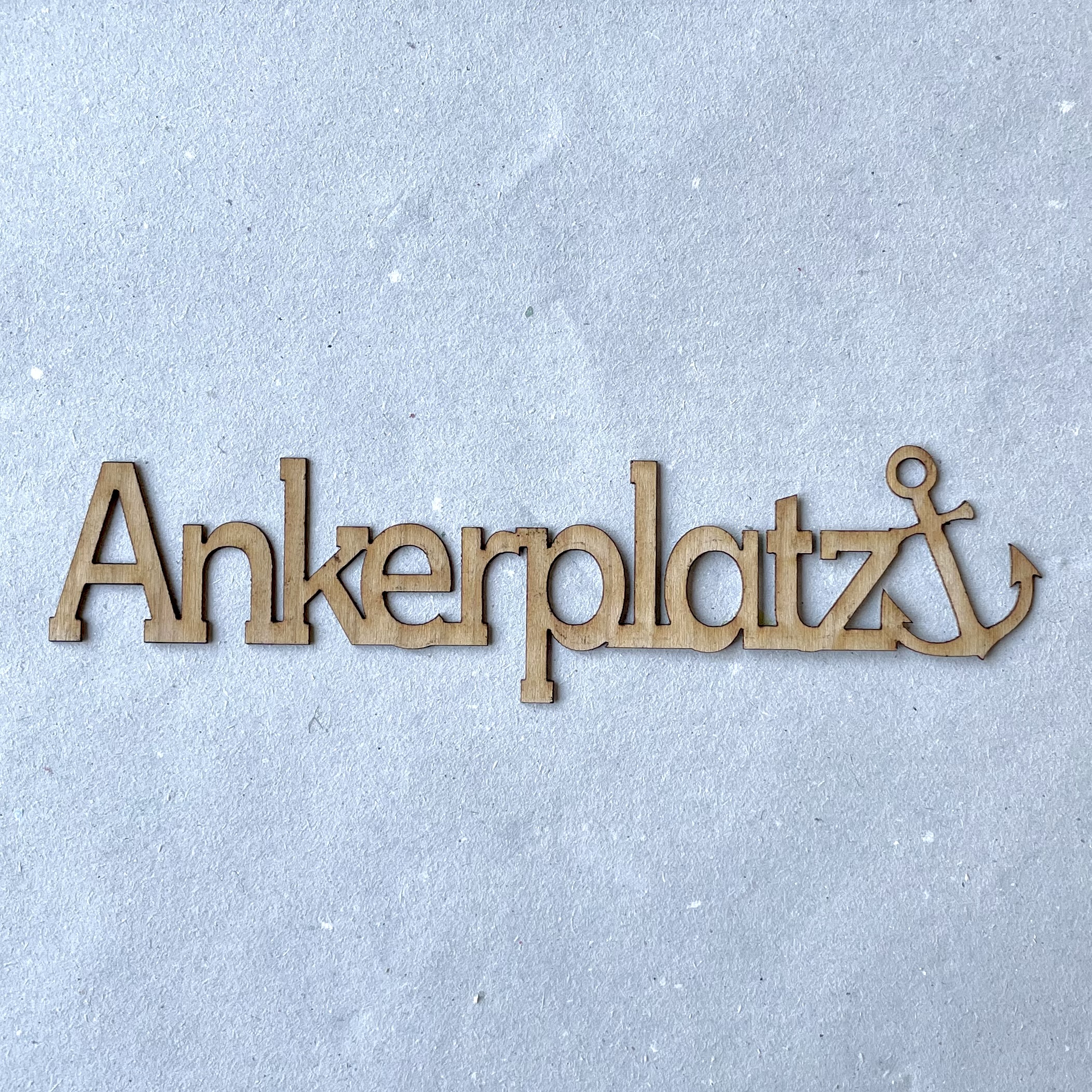 Schriftzug "Ankerplatz" L14,5cm, Kirschholz