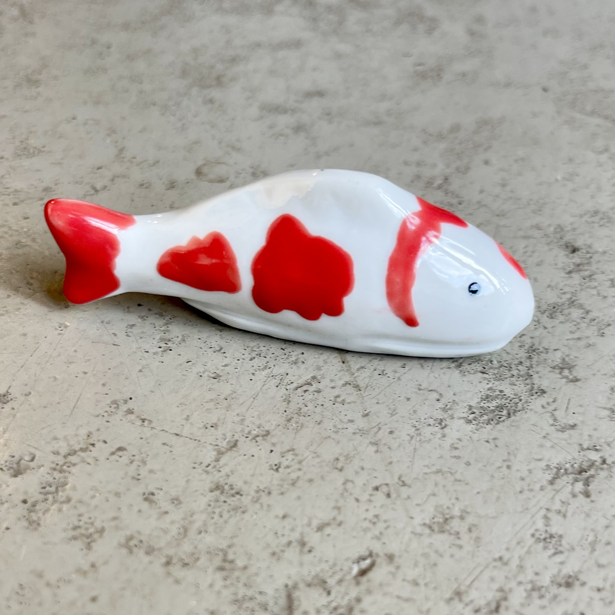 Schwimmfisch 7,5/2/2,5cm  rot/weiß 1