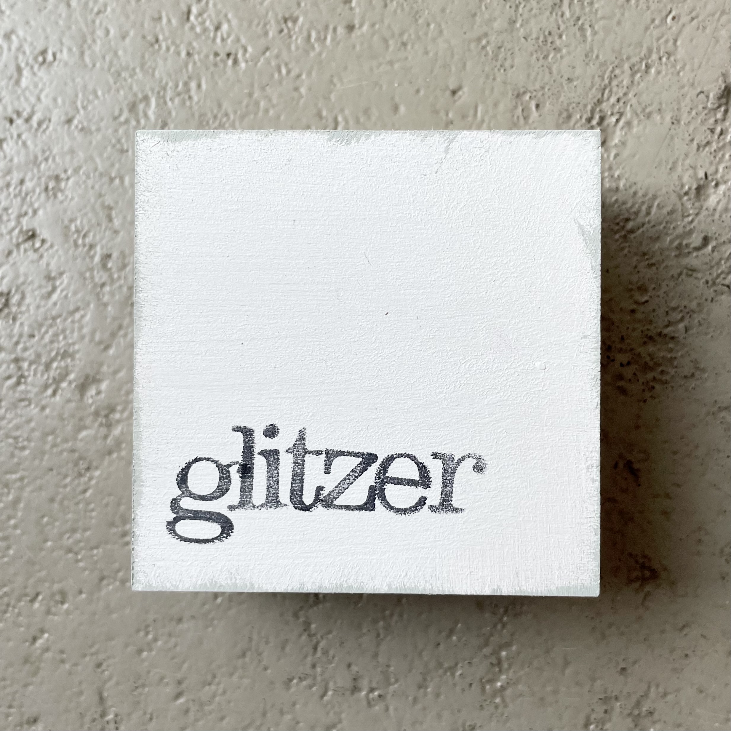Textplatte "glitzer" 6x6cm, weiß/schwarz