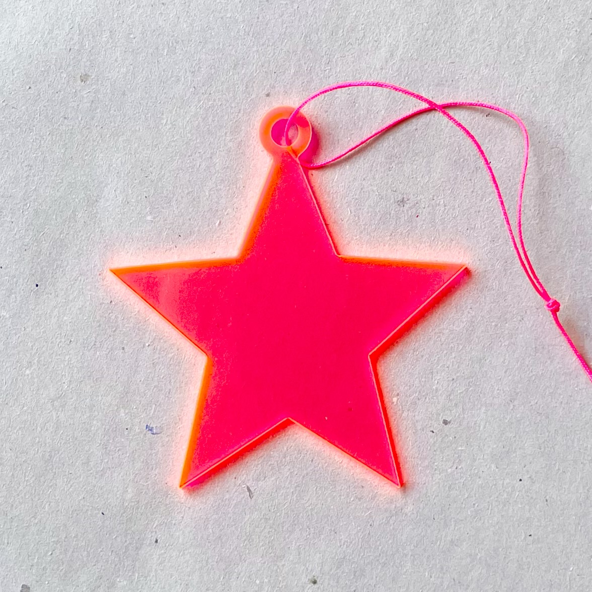 Stern aus Kunststoff D8cm, neonpink